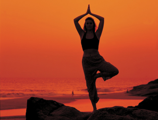 Yoga beach sunset in India - Neals Yard Holidays