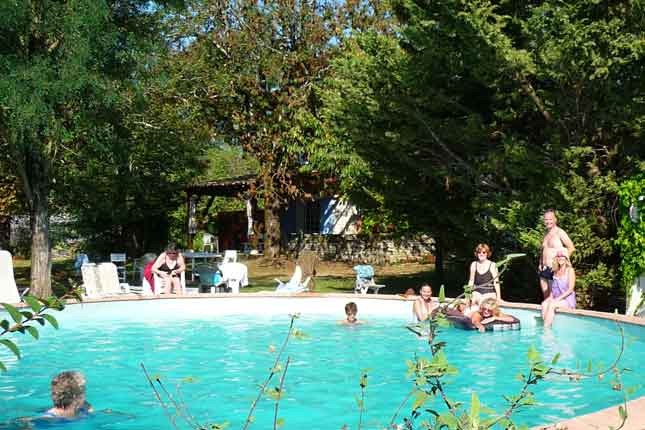 People by pool at La Roane in France